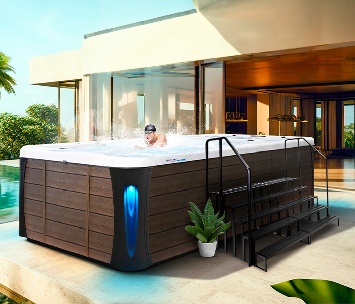 Calspas hot tub being used in a family setting - Garland